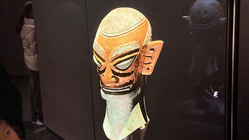 Bronze head wearing a gold mask