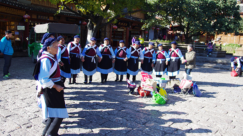 Naxi people are dancing in Lijiang Old Town